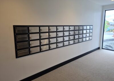 Jaloc Mail Boxes. Retirement Village / Apartment Foyer. Stainless Steel Door with Privacy Flap.